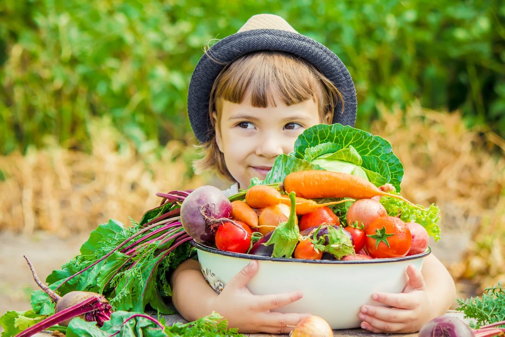 Child with vegetables
