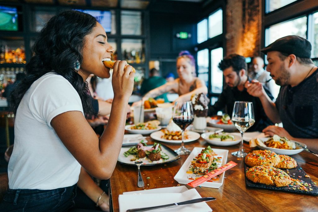 People enjoying food in a restaurant