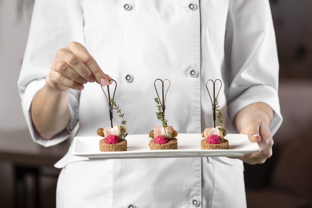 Chef with plate of food