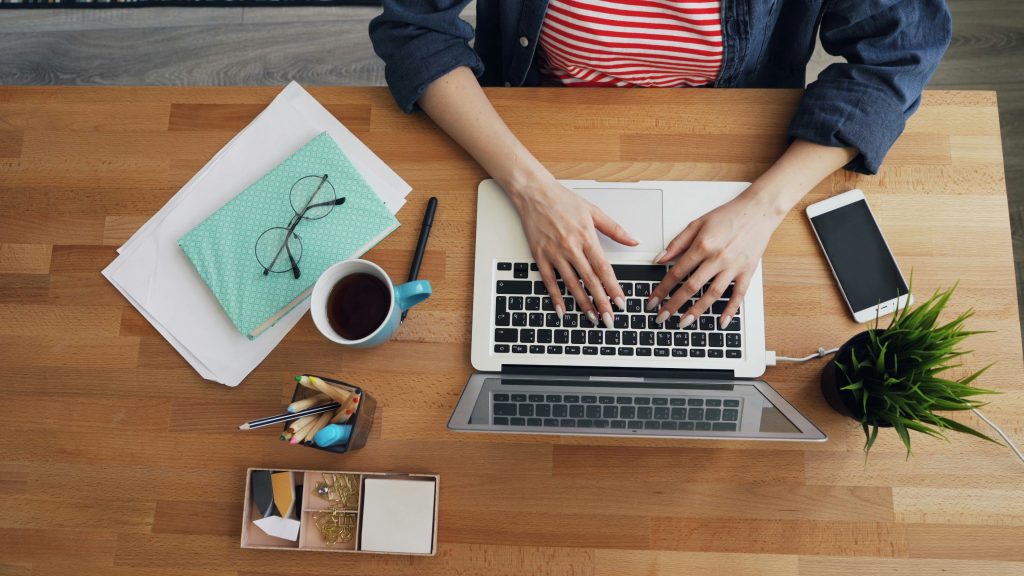 Clean office desk environment with laptop