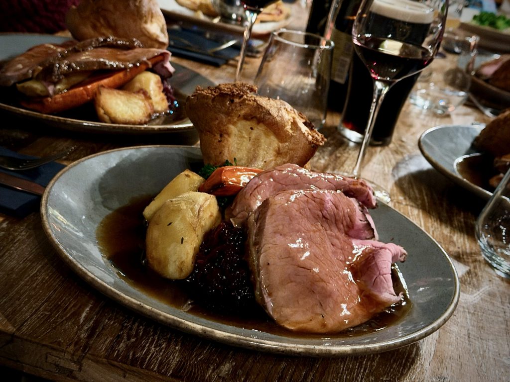 Sunday roast beef with Yorkshire pudding, roast potatoes and rich gravy at The Fleece Countryside Inn in Barkisland, one of the best Sunday lunches in West Yorkshire