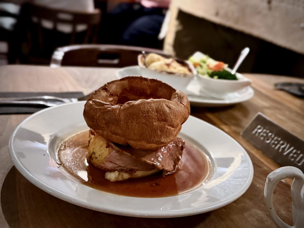 Yorkshire pudding served with roast beef and gravy during Sunday lunch at the Boothwood Inn in Rishworth, West Yorkshire