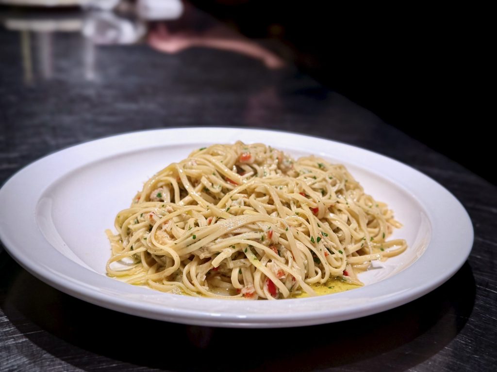 Fresh tagliarini pasta with Dorset crab, chilli and lemon served hot at Padella Shoreditch
