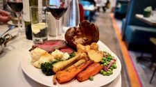 Roast Aberdeen Angus beef with Yorkshire pudding, roast potatoes, seasonal vegetables and cauliflower cheese at Clocktower Restaurant, Rudding Park