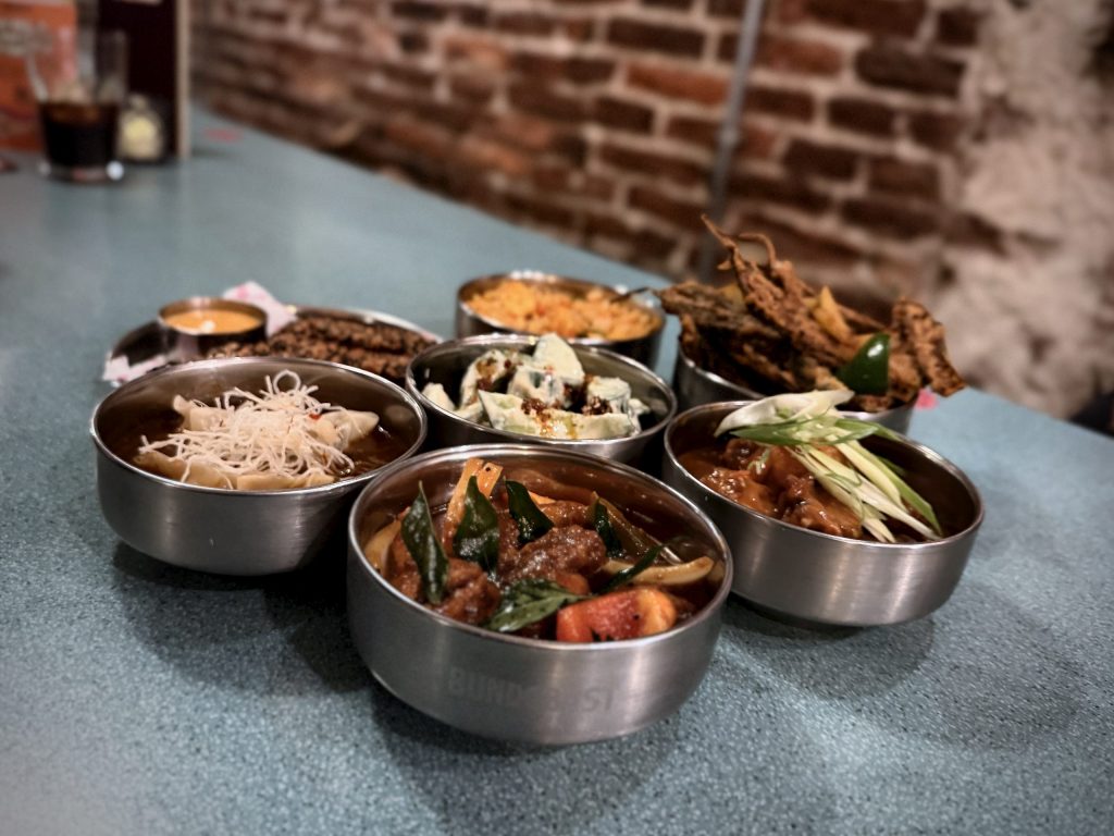 Indo-Chinese sharing feast at Bundobust Leeds featuring Gobi Manchurian, Bhutta 65, Manchow Momo Soup, Egg Fried Rice and Salt and Pepper Okra.