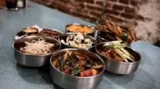 Indo-Chinese sharing feast at Bundobust Leeds featuring Gobi Manchurian, Bhutta 65, Manchow Momo Soup, Egg Fried Rice and Salt and Pepper Okra.