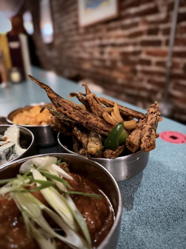 Salt and Pepper Okra Fries and Indo-Chinese small plates at Bundobust Leeds with crispy okra, green chillies and umami sauce.