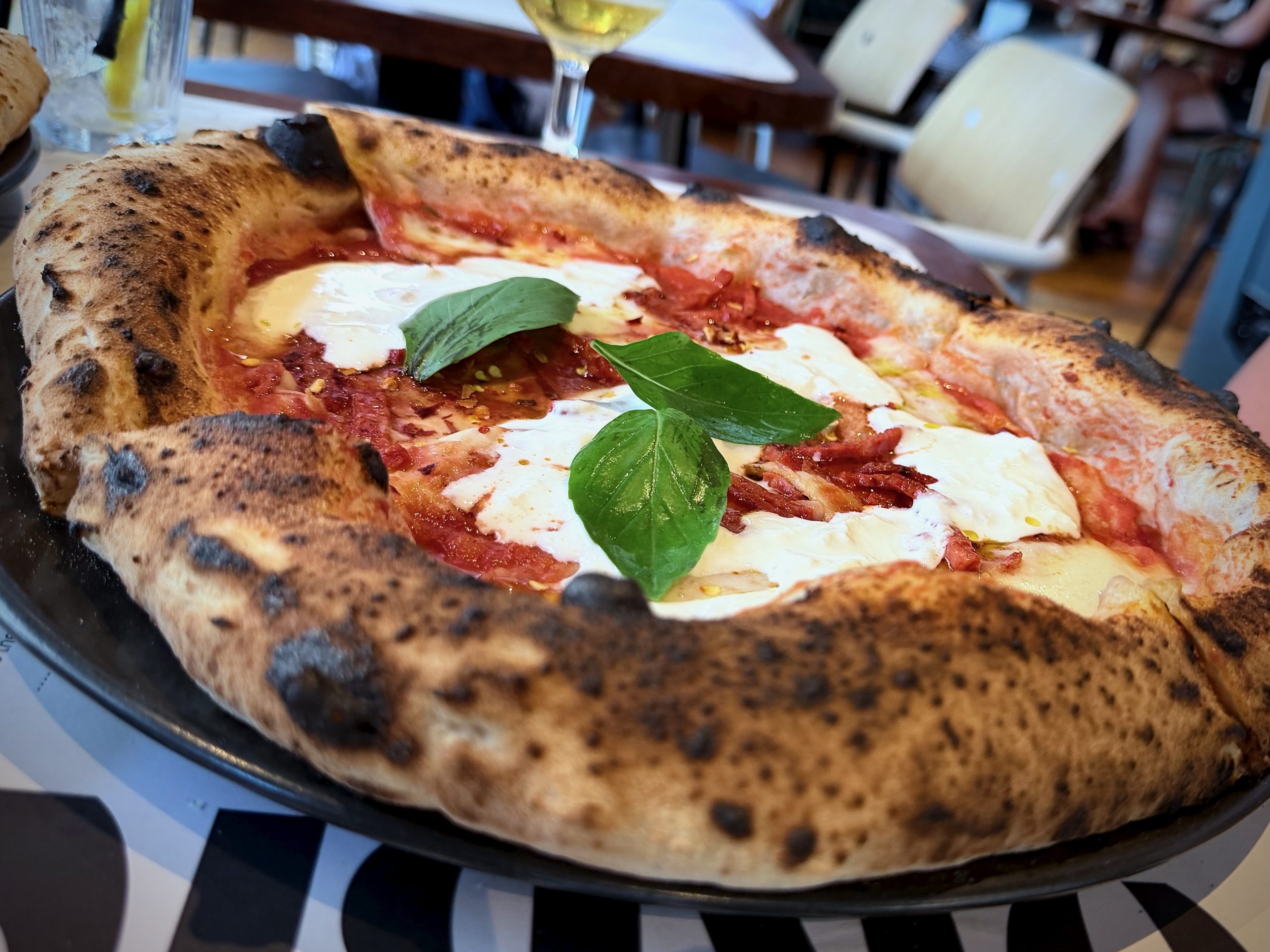 Diavola pizza with mozzarella, basil and chilli