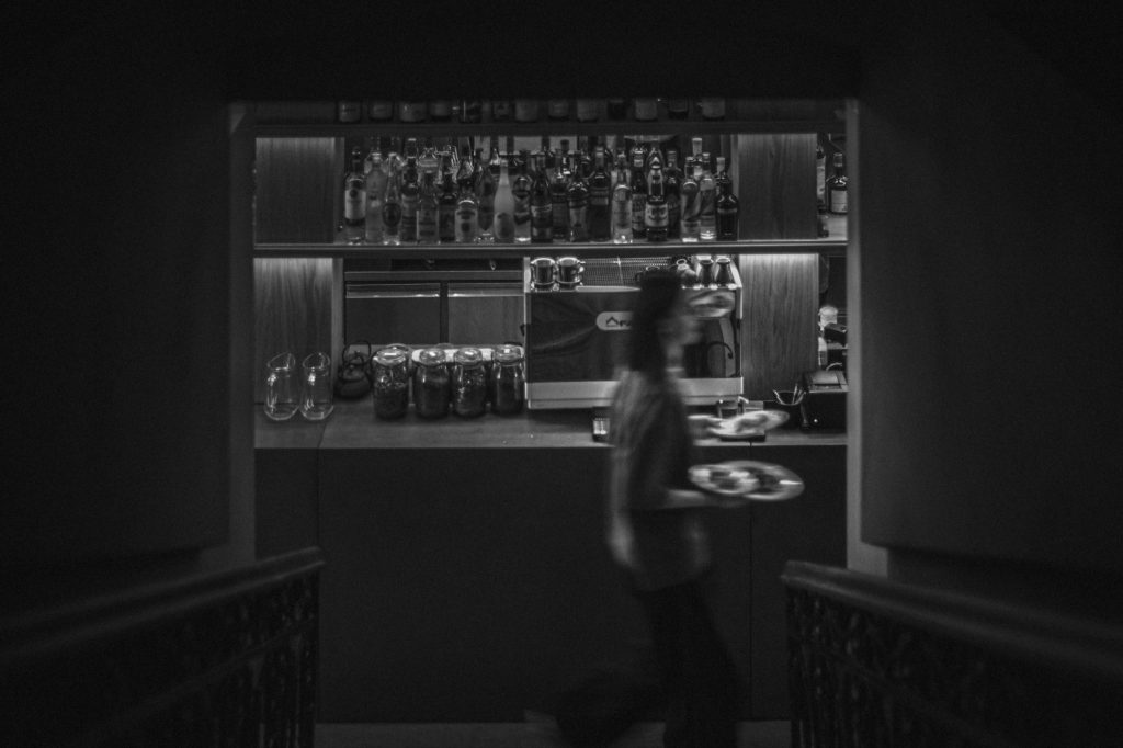 Yorkshire party cities nightlife bar with server carrying plates
