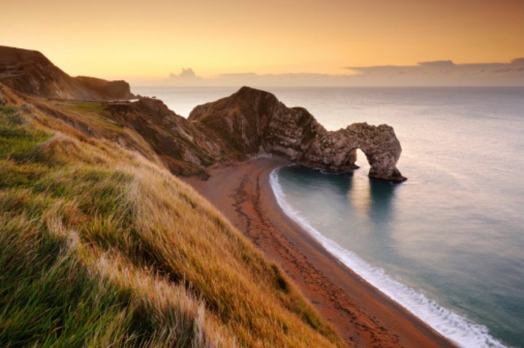 Durdle Door on the Dorset coast at sunset