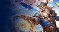 Smiling Viking warrior spinning a glowing casino prize wheel as gold coins fly through the air beneath pink blossom trees.