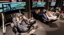 EPIC49 Kettering LAN players using racing simulator rigs