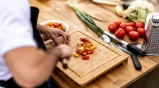 Private chef preparing fresh ingredients for a personalised meal at home
