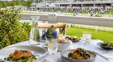 Race-day dining table overlooking a racecourse