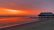 Sunset over Cleethorpes beach and pier near the Humber