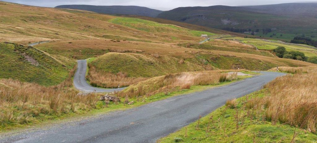Winding road through the Yorkshire Dales in an article about the UK bingo capital
