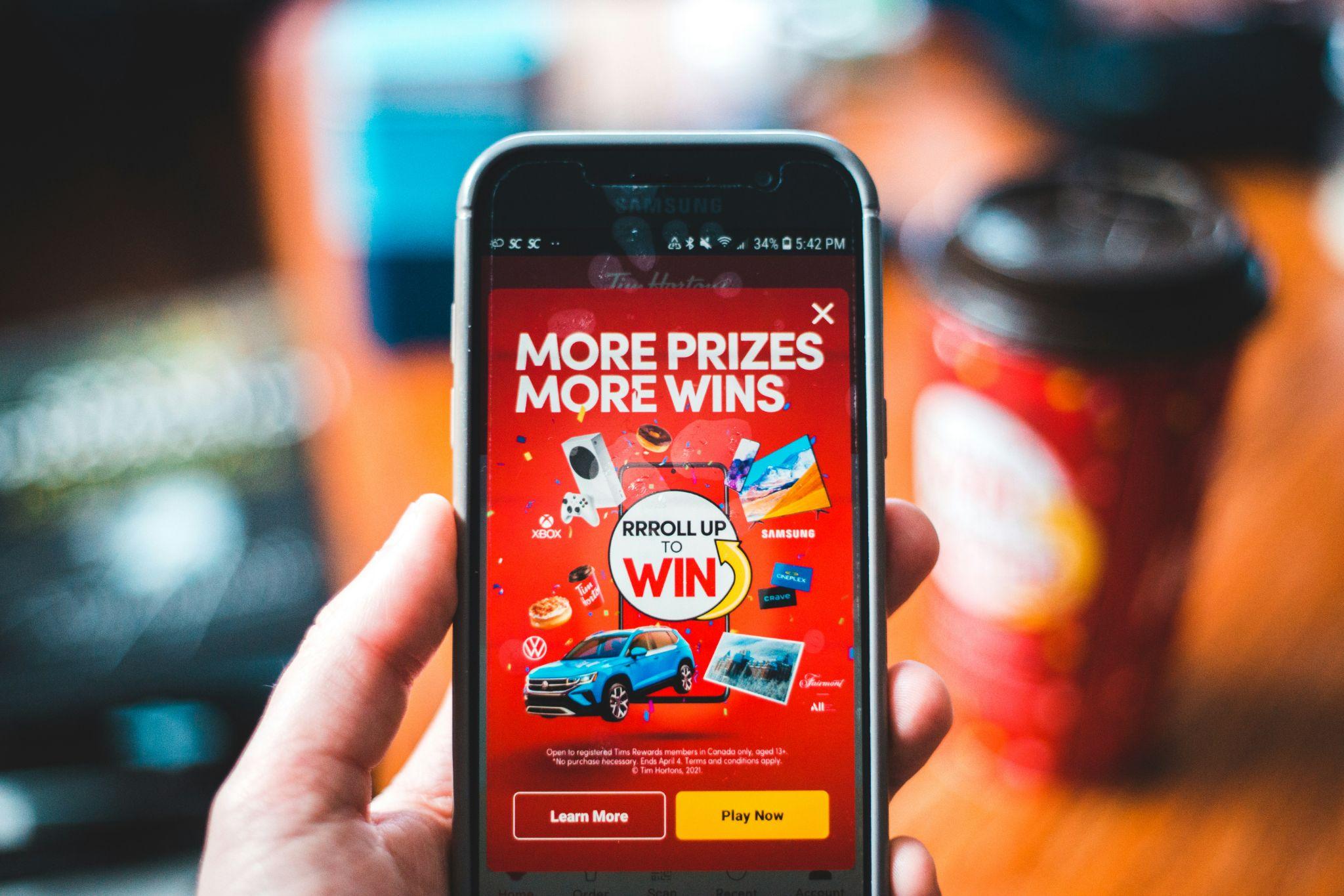 Person using a smartphone to access online bingo and gaming